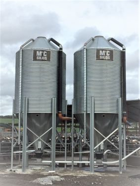 TWO 16 TONNE GALVANIZED SILOS WITH AUGERS CONNECTED ON A DAIRY FARM IN CO.MEATH 